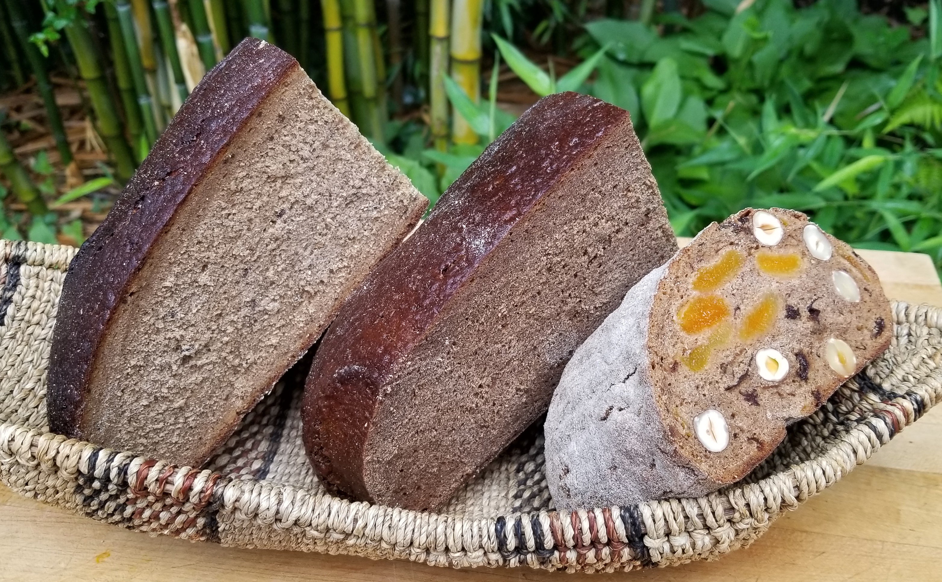 Rye bread. Pumpernickel bread. Fruits and Nuts bread. Served in an Indigenous African basket.